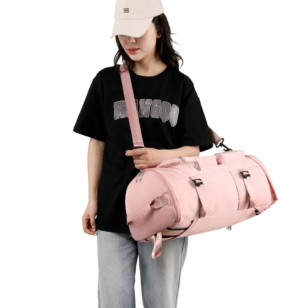 Sac à dos de voyage en toile Oxford rose porté en bandoulière