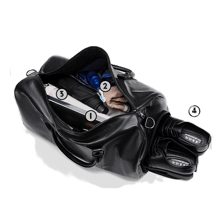 Sac de voyage aspect cuir rétro noir ouvert et chargé d'affaires de voyage