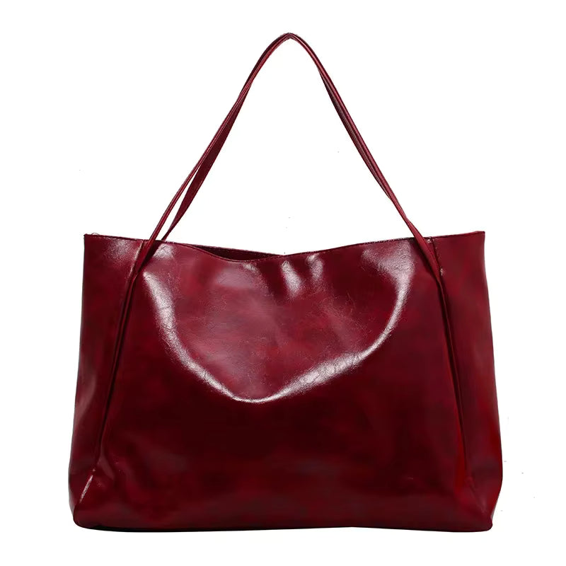 Sac seau aspect cuir souple bordeaux – vue de face