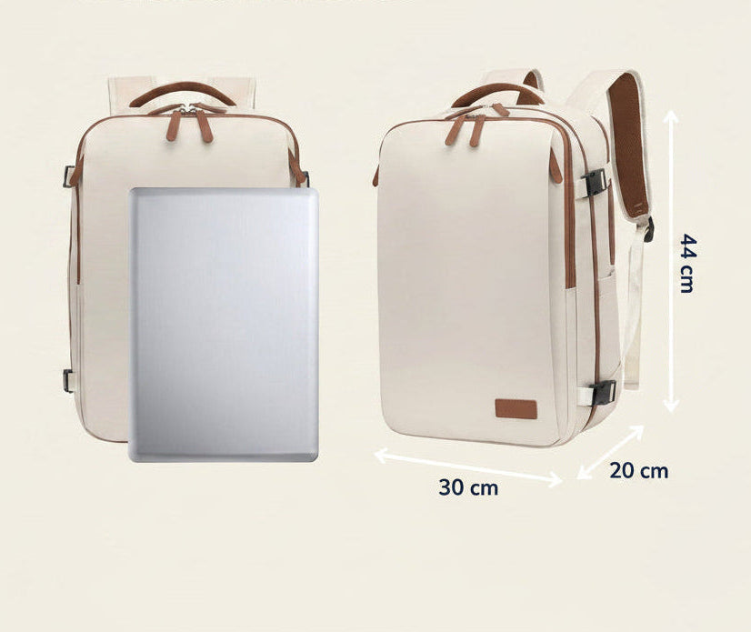 Schéma des dimensions du sac à dos cabine blanc cassé, un ordinateur portable posé devant